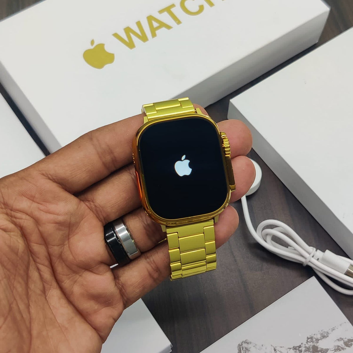 Gold Ultra Watch with apple logo